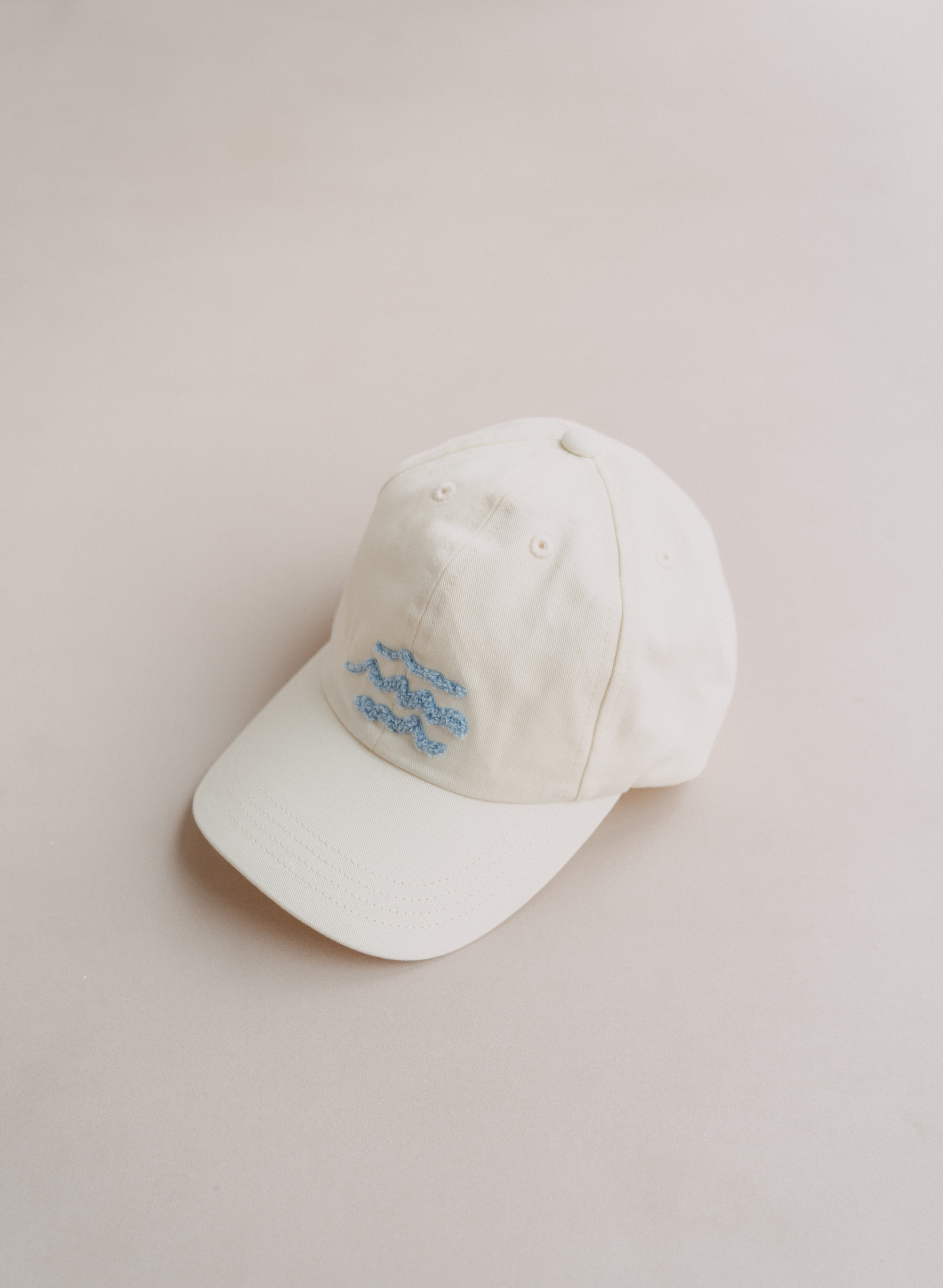 CAP ECRU WAVES