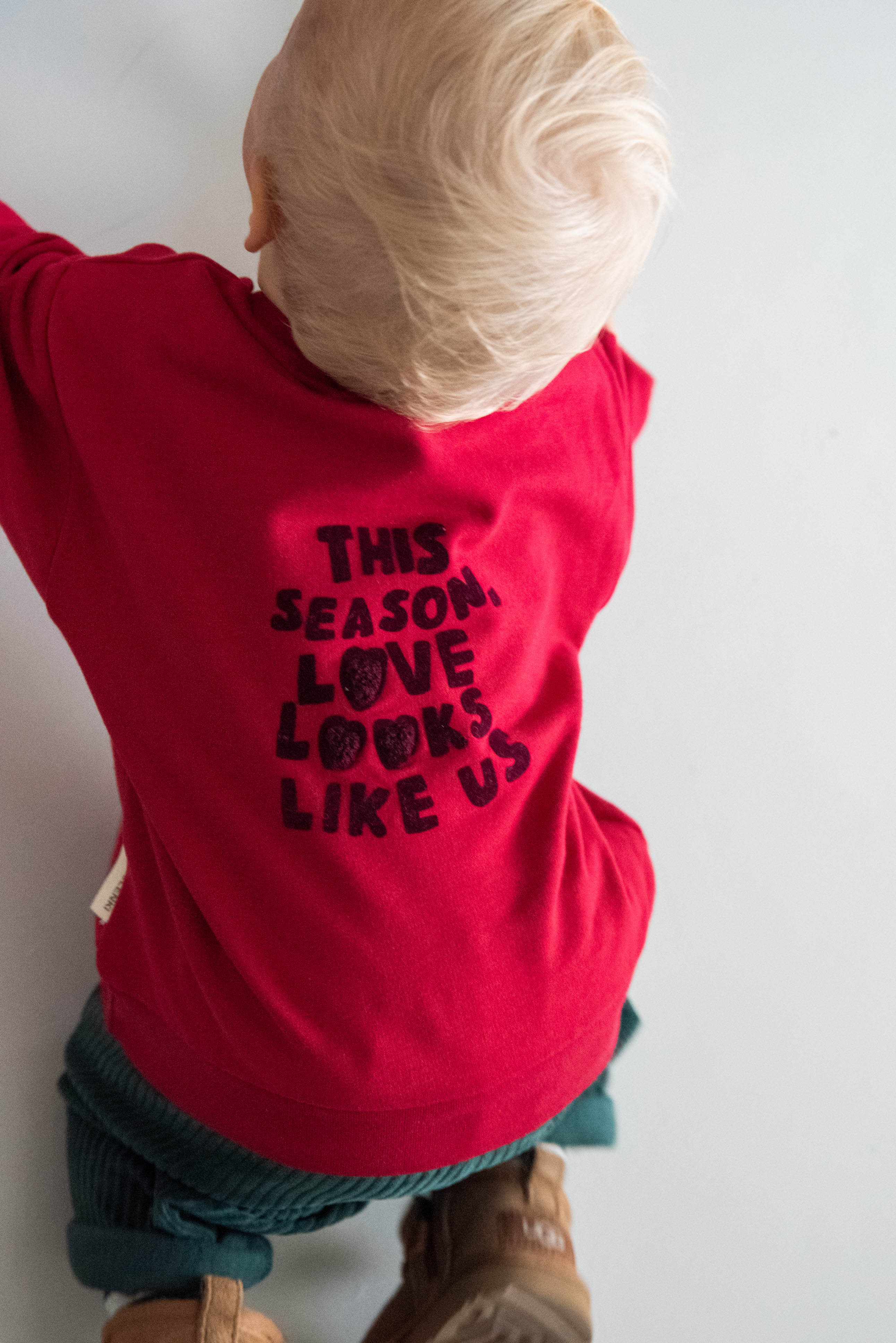 LOVE LOOKS LIKE US SWEATER